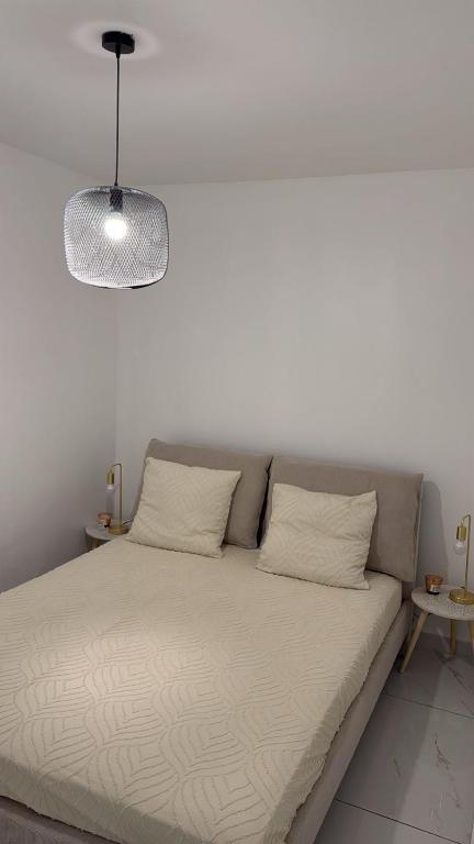 Postel nebo postele na pokoji v ubytování MBA house