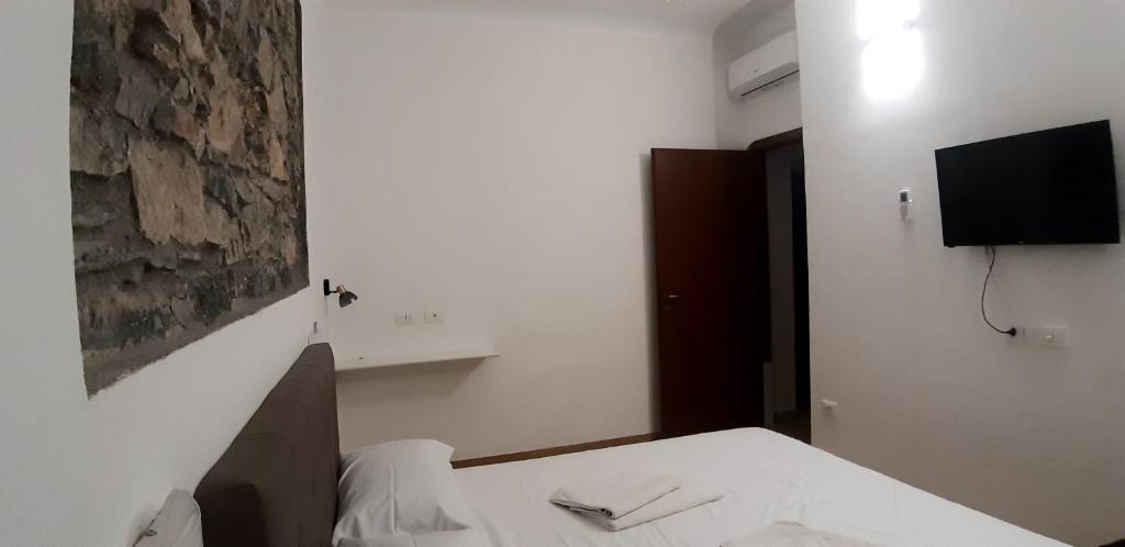Televízia a/alebo spoločenská miestnosť v ubytovaní Chez Sabrine - La Spezia Via Fiume 112
