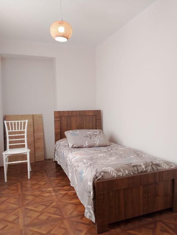 Postel nebo postele na pokoji v ubytování PANDA Family Hotel in Senaki