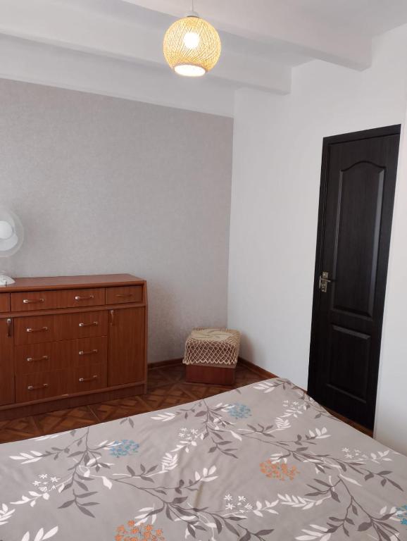 Postel nebo postele na pokoji v ubytování PANDA Family Hotel in Senaki