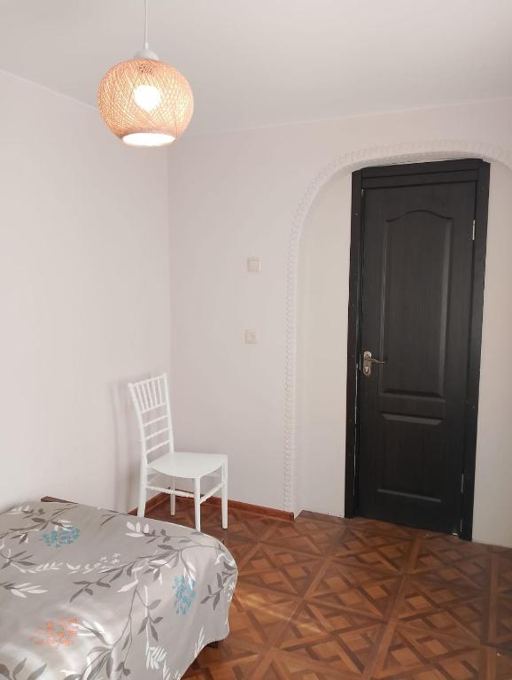 Postel nebo postele na pokoji v ubytování PANDA Family Hotel in Senaki