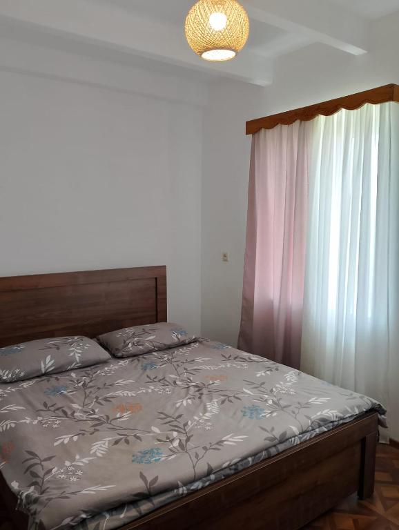 Postel nebo postele na pokoji v ubytování PANDA Family Hotel in Senaki