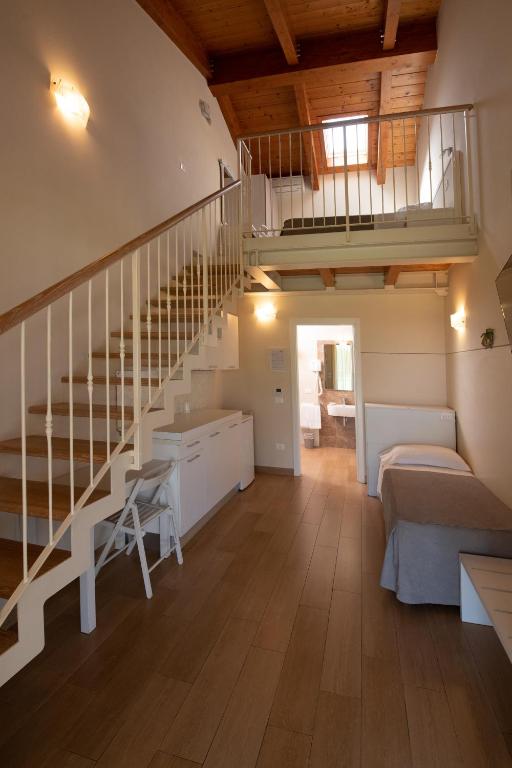 Postel nebo postele na pokoji v ubytování Agriturismo B&B Vista Parco