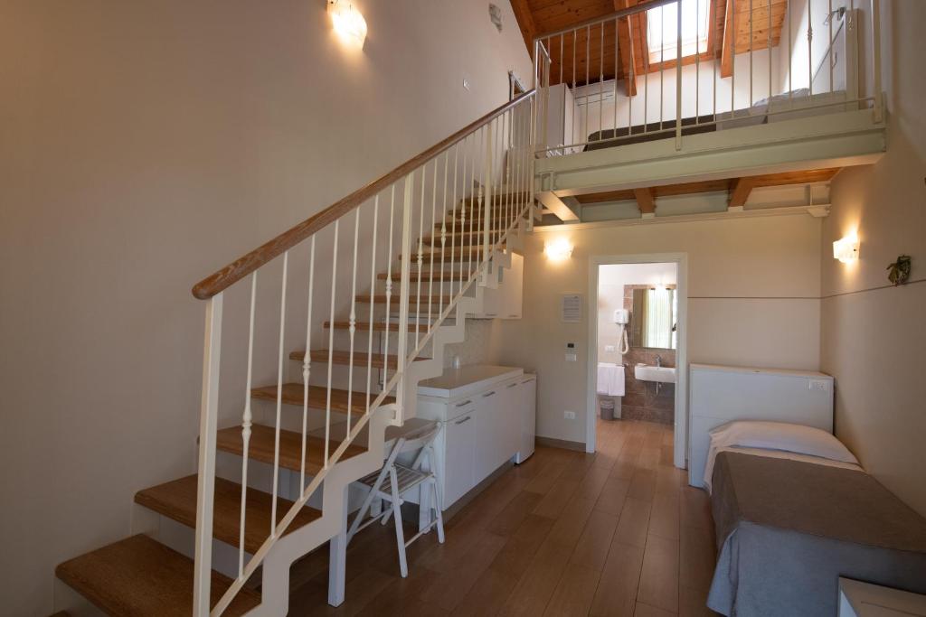 Postel nebo postele na pokoji v ubytování Agriturismo B&B Vista Parco