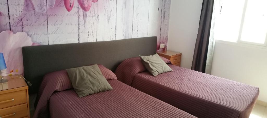 Postel nebo postele na pokoji v ubytování Apartment Ambrosia