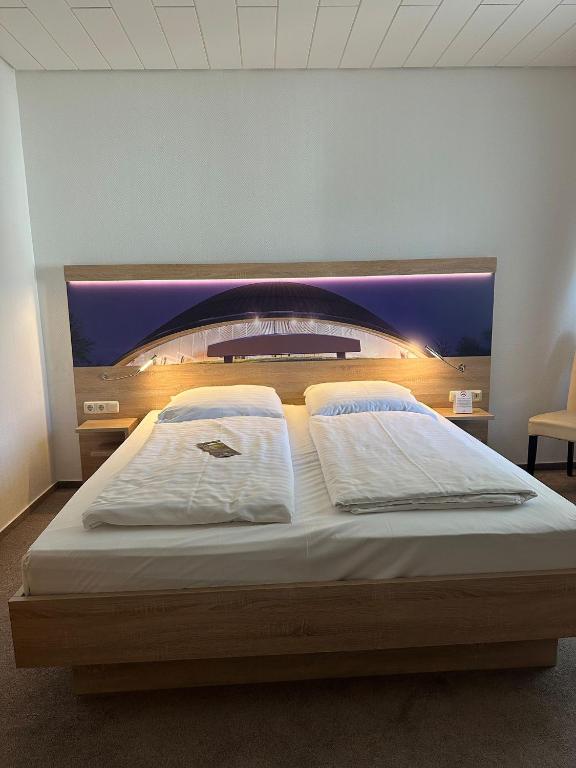 Postel nebo postele na pokoji v ubytování Haven Hotels - Bochum