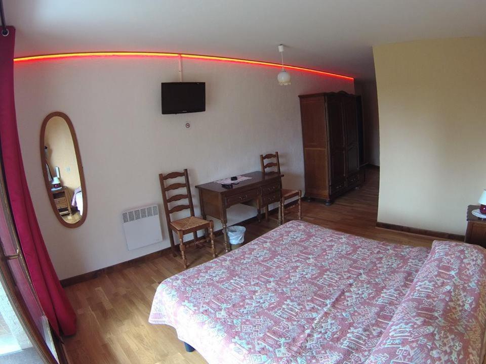 Postel nebo postele na pokoji v ubytování Boustigue Hotel
