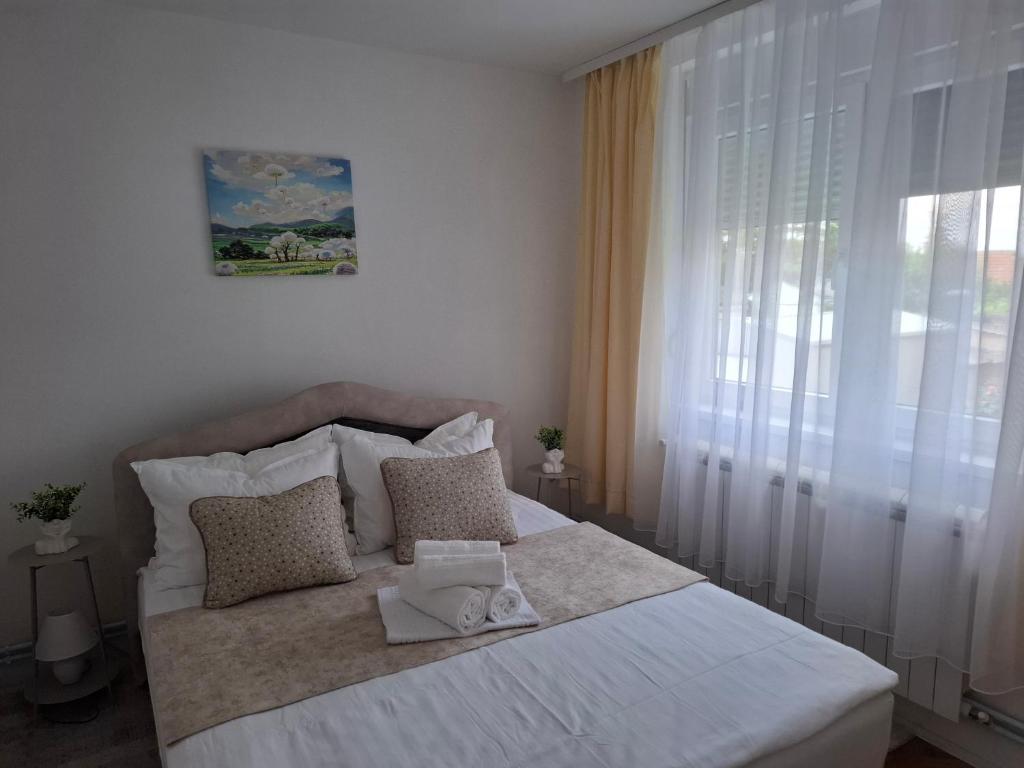 Postel nebo postele na pokoji v ubytování Apartman Demetra