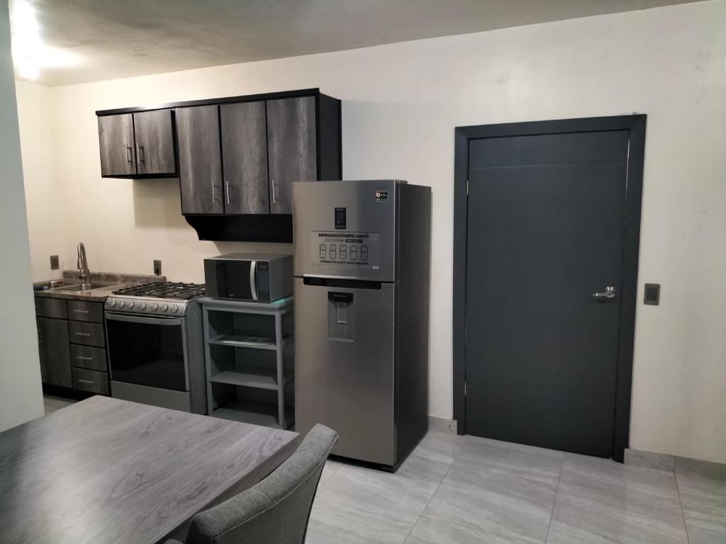 Η κουζίνα ή μικρή κουζίνα στο Departamento Esperanza 1