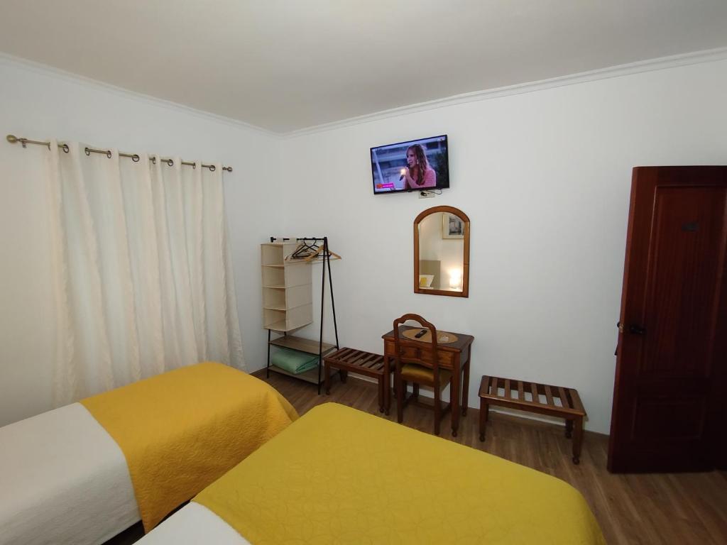 Postel nebo postele na pokoji v ubytování AL - Casa 42
