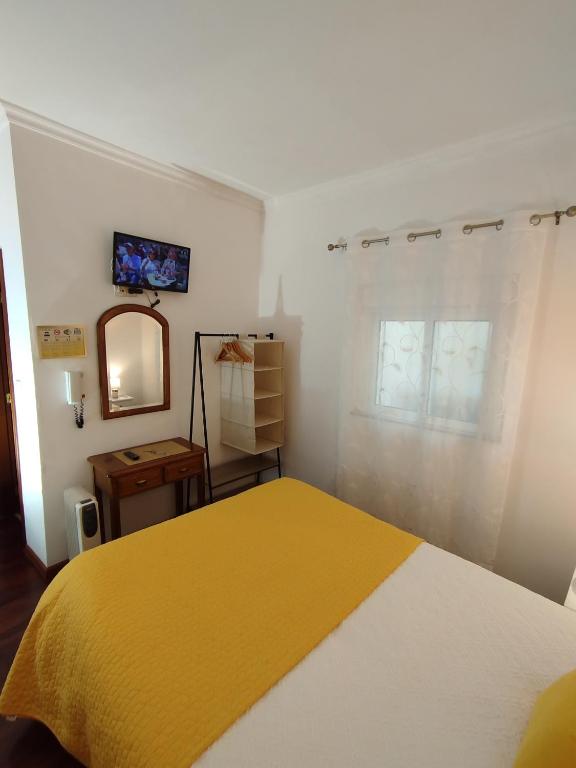 Postel nebo postele na pokoji v ubytování AL - Casa 42