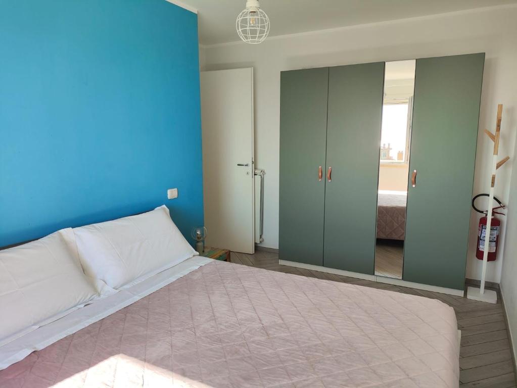 A bed or beds in a room at AGM Suite - Rome Airport FCO - Fiumicino Mare