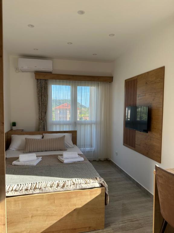 Postel nebo postele na pokoji v ubytování AS apartmani