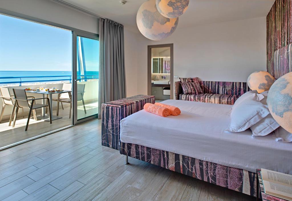 Кровать или кровати в номере Bibione Palace Hotel
