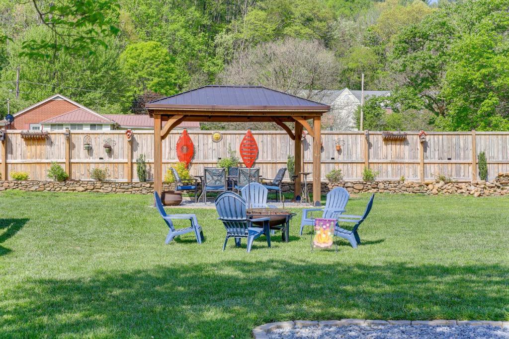 a gazebo with chairs and a table in a yard at Walk to River and Trails Cozy Damascus Cottage! in Damascus