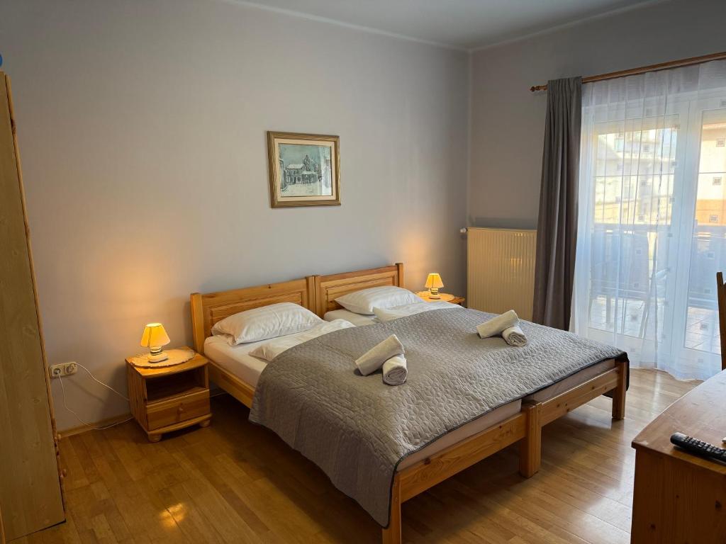 Postel nebo postele na pokoji v ubytování Lucky Villa