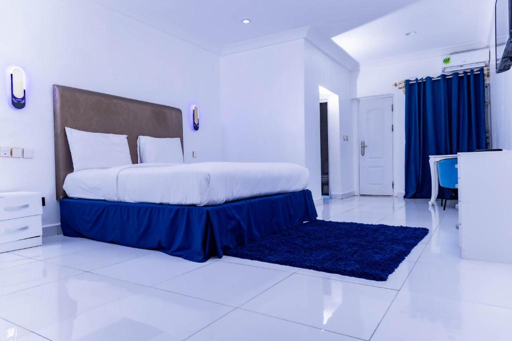 Postel nebo postele na pokoji v ubytování Pinorich Hotel
