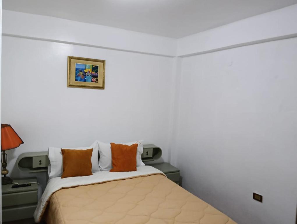 Postel nebo postele na pokoji v ubytování Andean Hostel