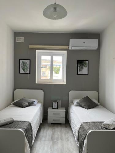 Postel nebo postele na pokoji v ubytování Cozy 3 room house in Eslöv