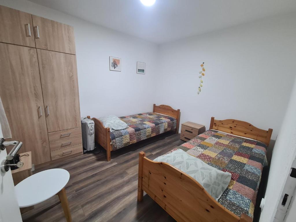 Postel nebo postele na pokoji v ubytování Kod deda Radosava