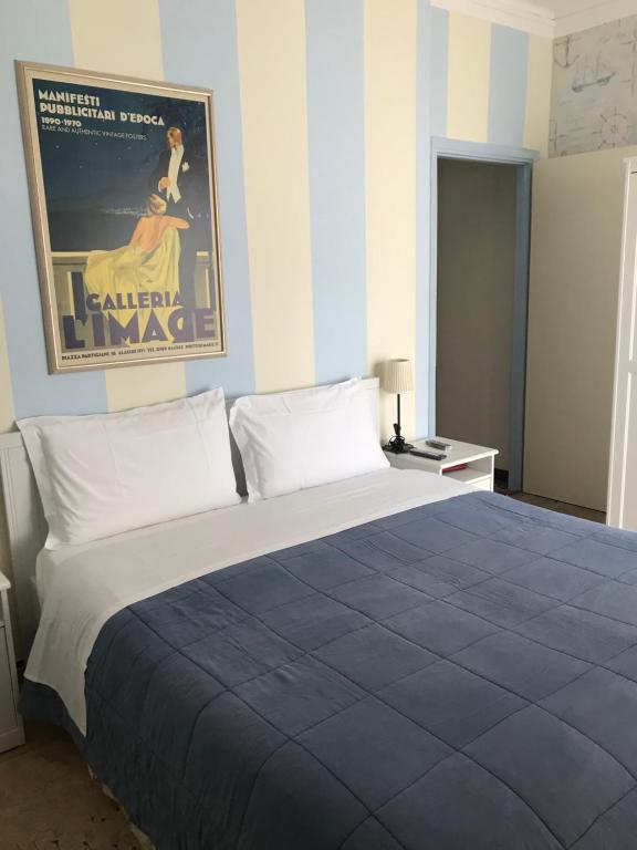 Postel nebo postele na pokoji v ubytování Locanda Kon Tiki