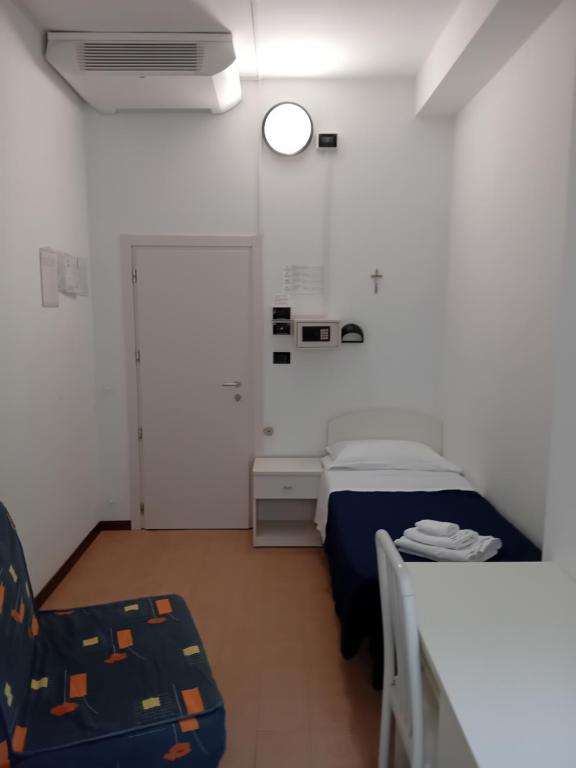 Postel nebo postele na pokoji v ubytování Hotel Mira