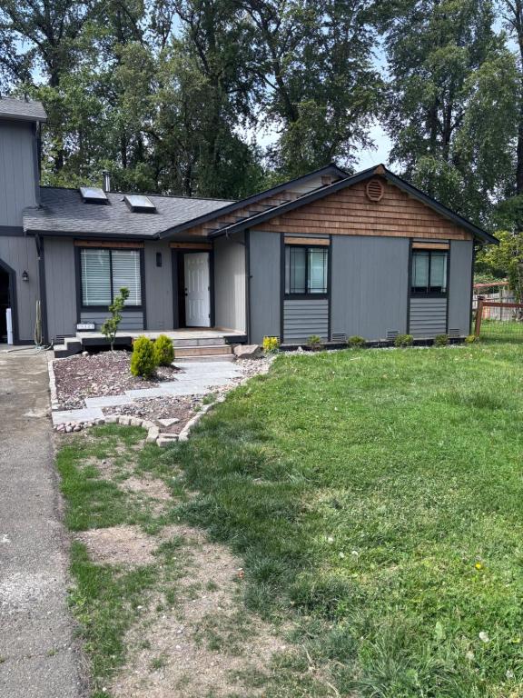 a house with a grass yard in front of it at North Marysville Home in Marysville