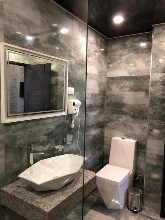 Koupelna v ubytování WIAGGIO Hotel