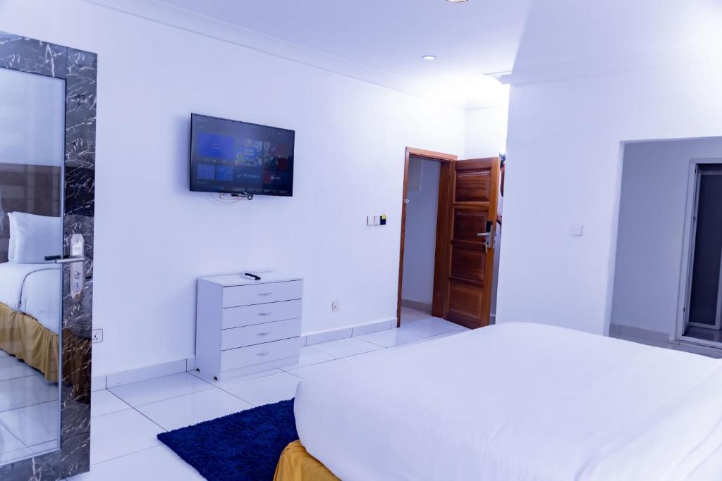 Postel nebo postele na pokoji v ubytování Pinorich Hotel