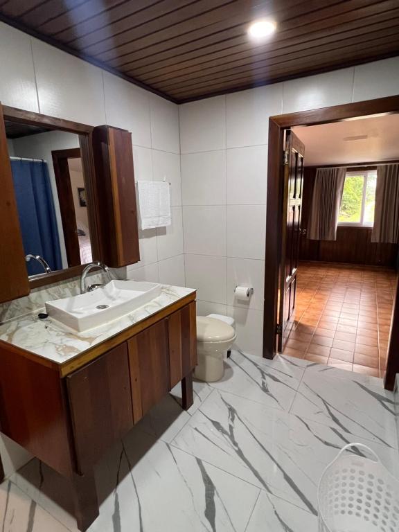 Postel nebo postele na pokoji v ubytování Villa Aurora Coral