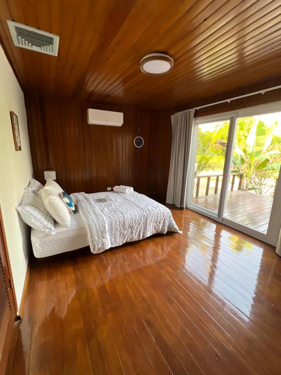 Postel nebo postele na pokoji v ubytování Villa Aurora Coral
