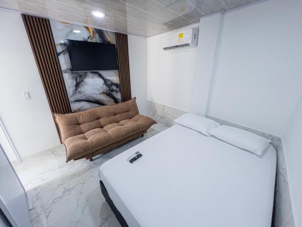 Ένα ή περισσότερα κρεβάτια σε δωμάτιο στο Casa Gaira 2 Vacation