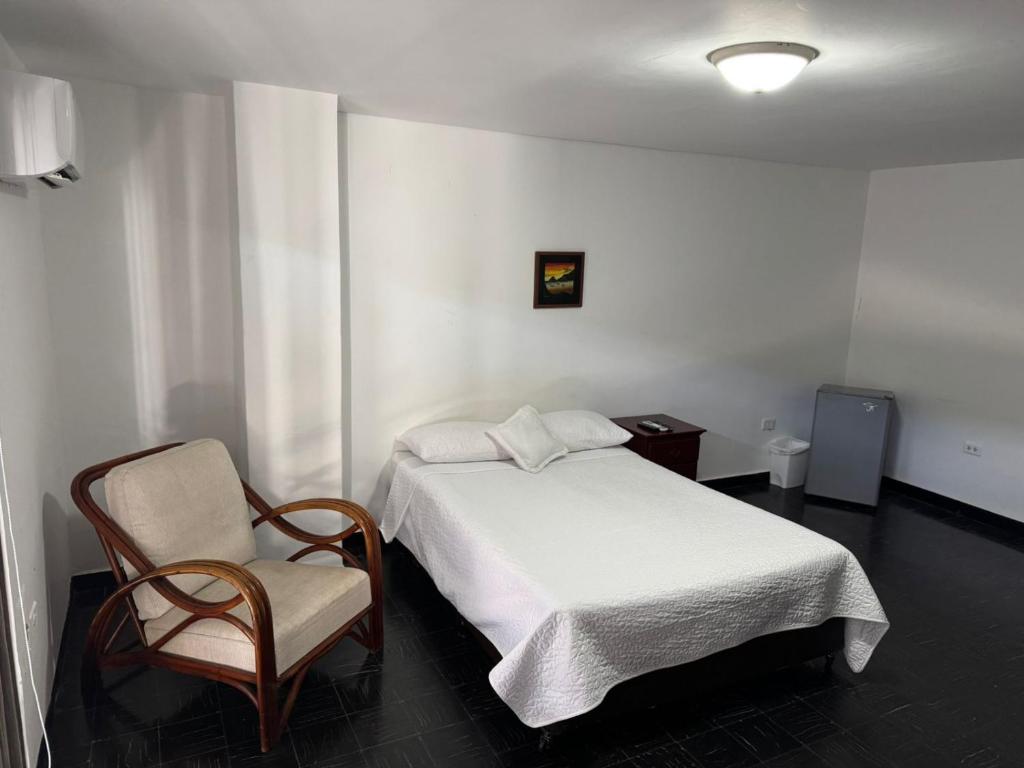Uma cama ou camas num quarto em Vallclaire Suites