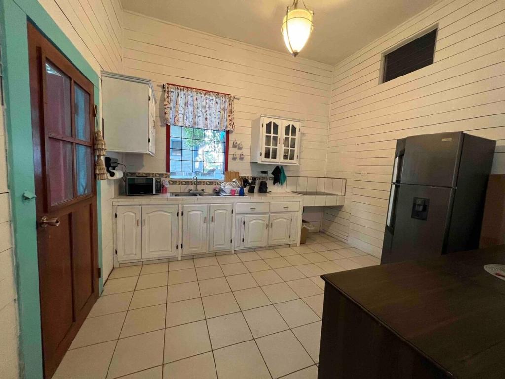 Kuchyň nebo kuchyňský kout v ubytování Villa Aurora Ardilla