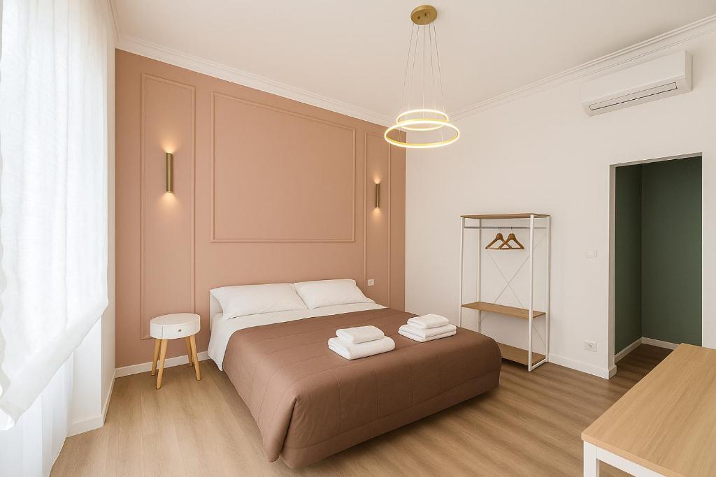 Postel nebo postele na pokoji v ubytování B&B Aurelia Garden Rooms