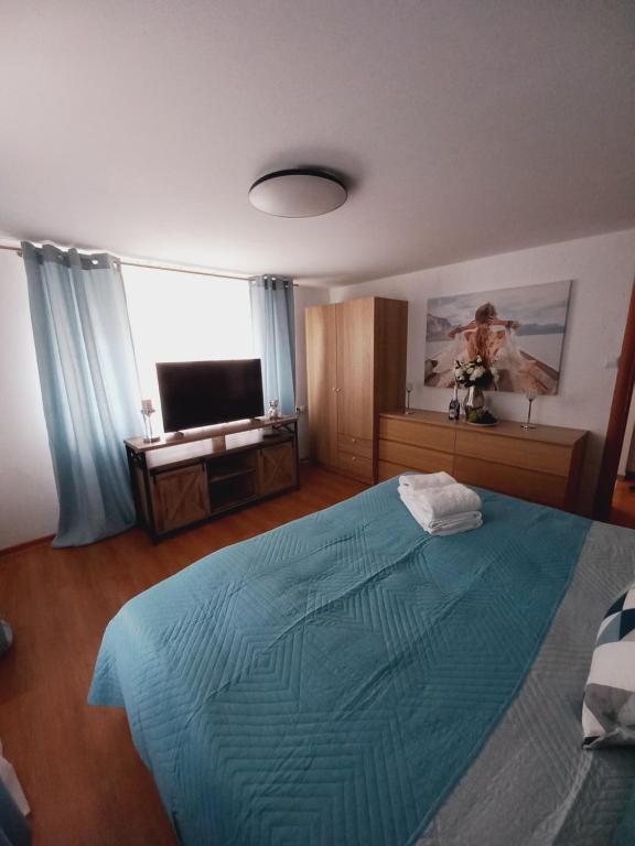 Posteľ alebo postele v izbe v ubytovaní Apartament 2 sypialnie z kuchnią - 200 metrów od morza