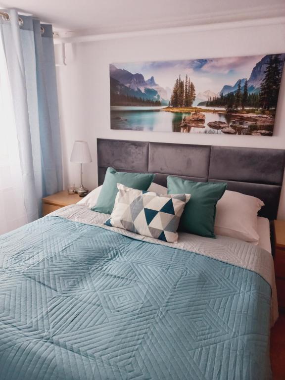 Posteľ alebo postele v izbe v ubytovaní Apartament 2 sypialnie z kuchnią - 200 metrów od morza