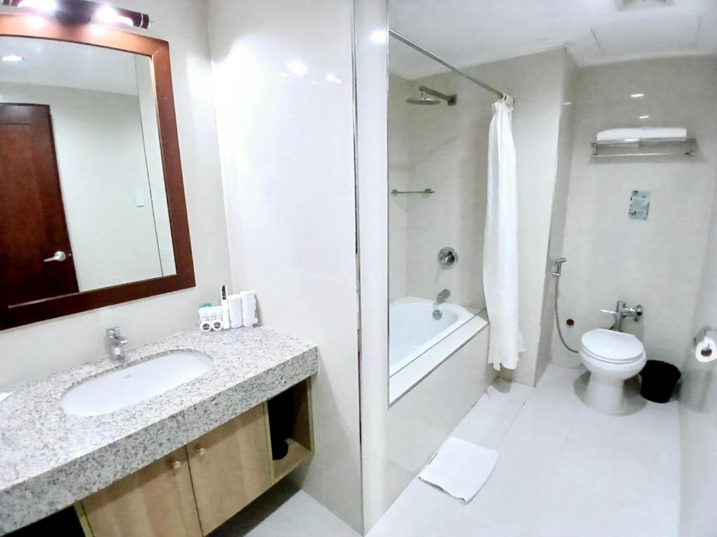 Koupelna v ubytování Dohera Hotel