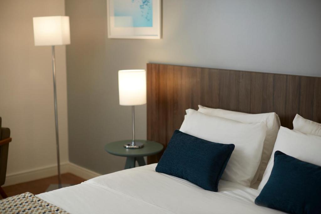 Postel nebo postele na pokoji v ubytování Tulip Inn Itaguai