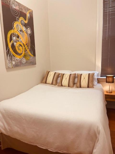 Voodi või voodid majutusasutuse CitiRooms Auckland toas
