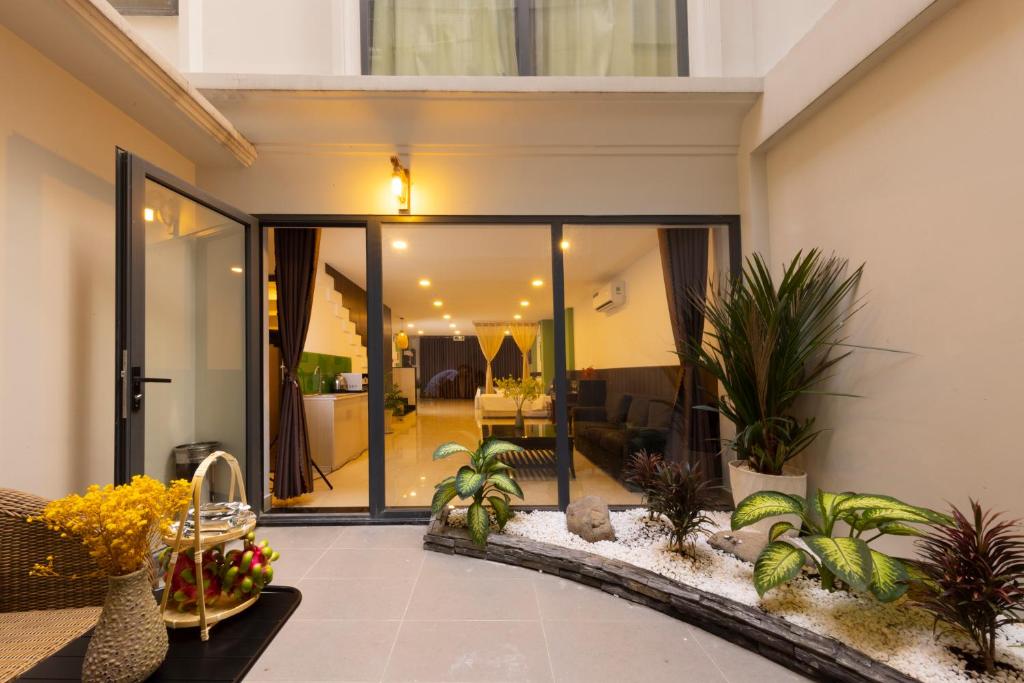 Κήπος έξω από το Anpha Apartment Hotel Ben Thanh
