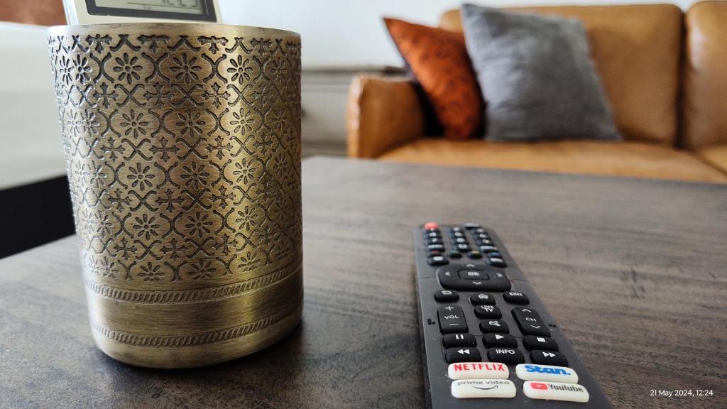 TV a/nebo společenská místnost v ubytování Pacific Palms Motor Inn