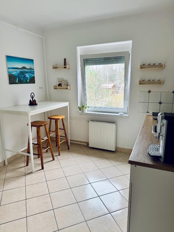 Kuchyňa alebo kuchynka v ubytovaní Csodakertes kisház Balatonfűzfőn