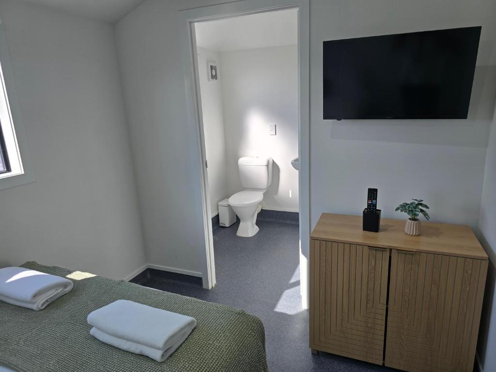 Postel nebo postele na pokoji v ubytování Microtel Lodge