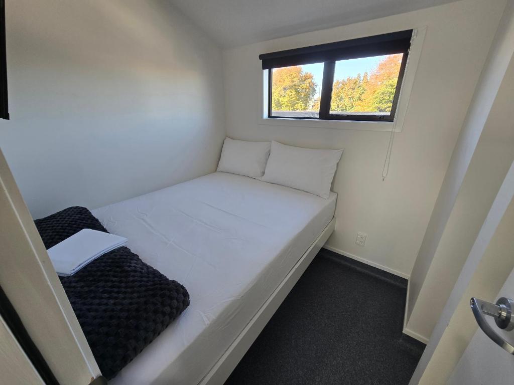 Postel nebo postele na pokoji v ubytování Microtel Lodge