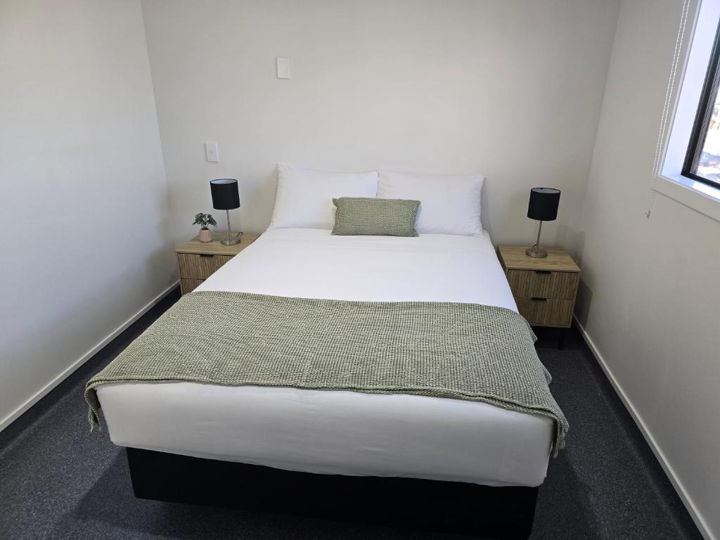 Postel nebo postele na pokoji v ubytování Microtel Lodge