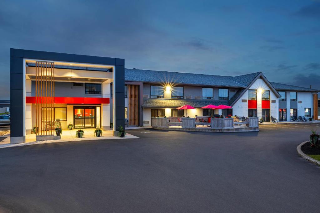 an empty parking lot in front of a hotel at Comfort Inn in Charlottetown