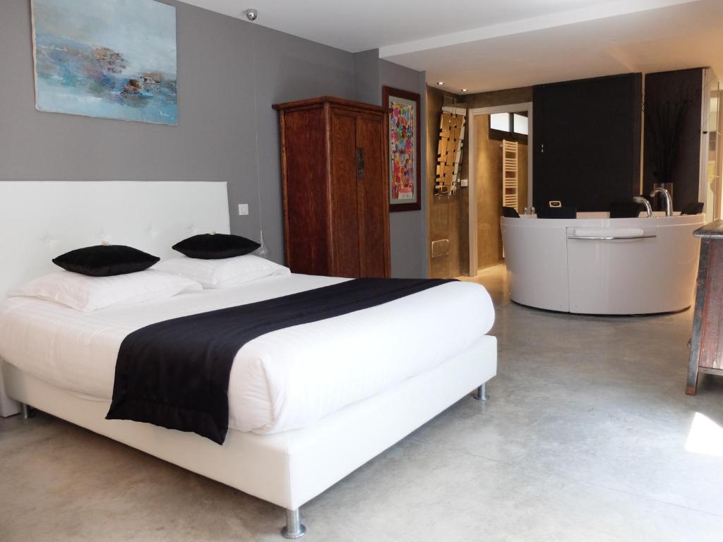 Postel nebo postele na pokoji v ubytování Be Loft B&B Pool & Spa