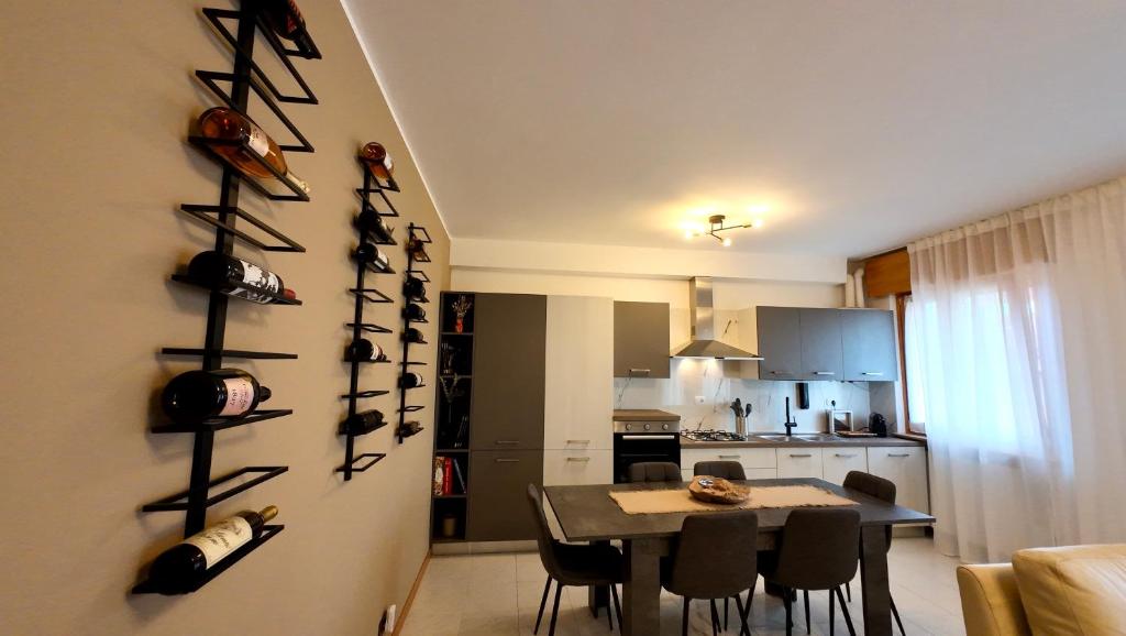 Kuchyň nebo kuchyňský kout v ubytování Garda Lake Holiday Apartments quadrilocale
