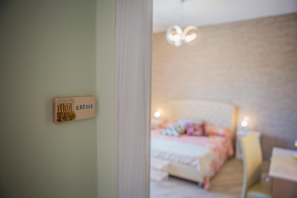 Postel nebo postele na pokoji v ubytování le Notti di Morfeo